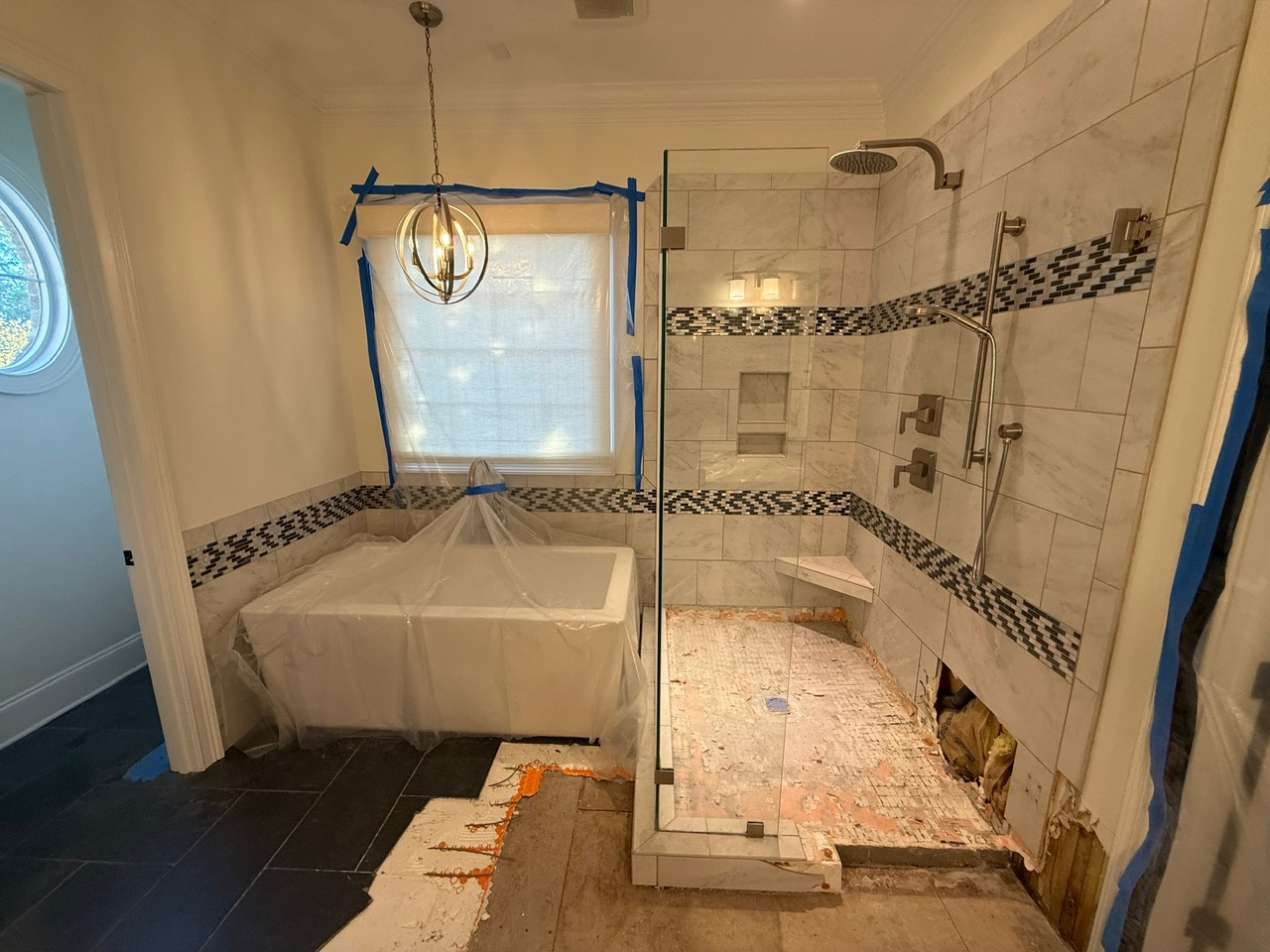 Before: original primary shower in the Marchbanks home in Greer, SC prior to the cave-style walk-in remodel - photo 1