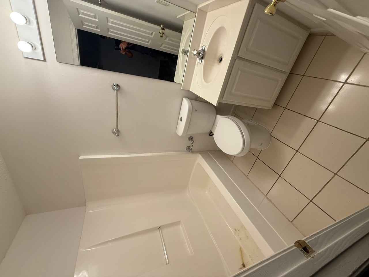 Two-bathroom remodel in Anderson, SC for the Prioleau family with new vanity, tile surround tub, and updated fixtures - photo 1