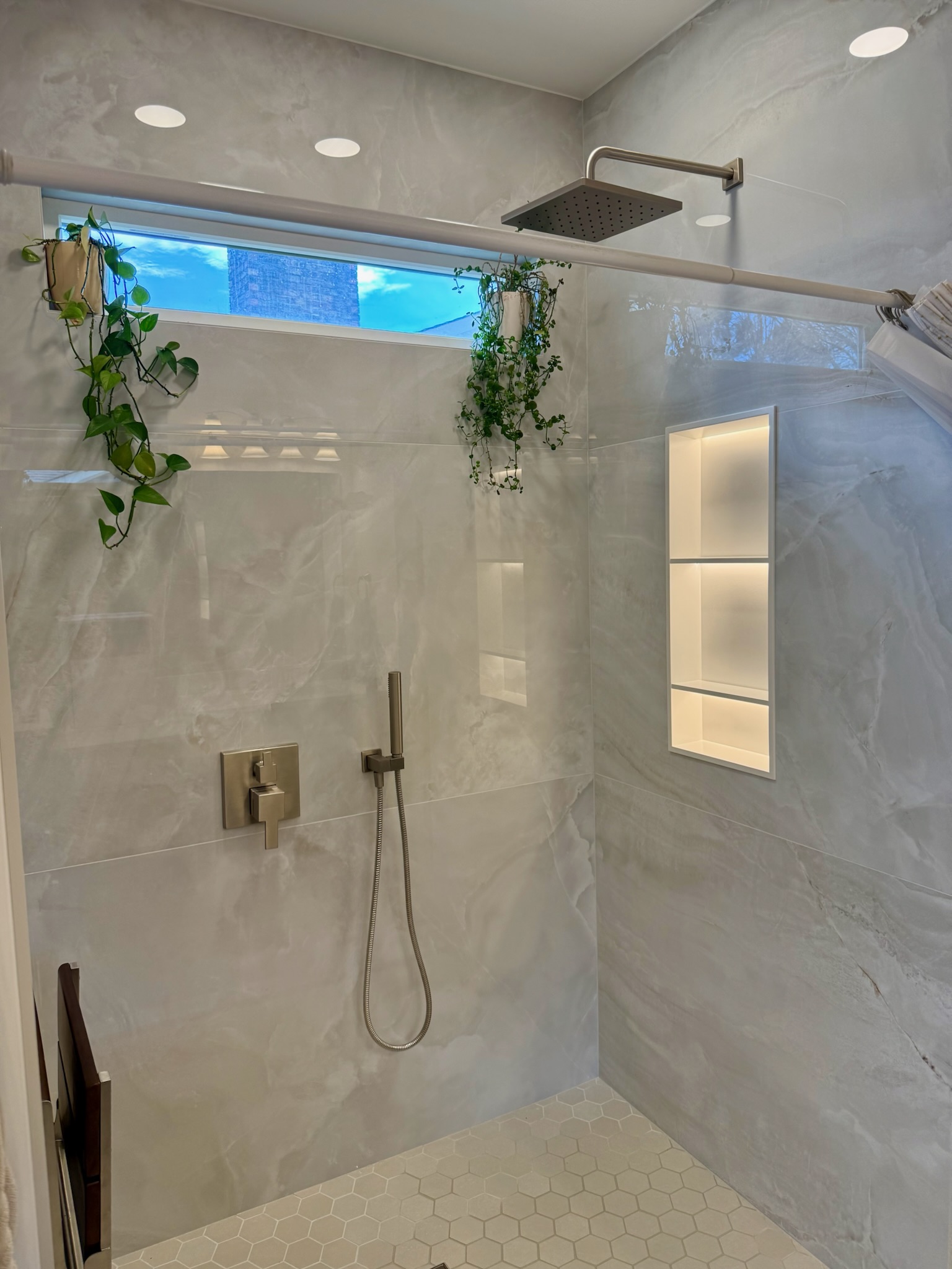 Bathroom refresh in Upstate, SC showing improved shower/tub finish and coordinating fixtures - Sandra project photo 3