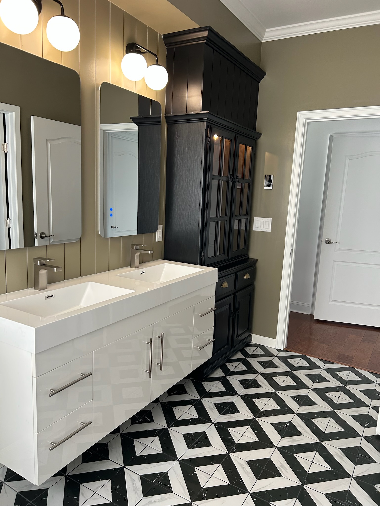Reconfigured bathroom in Greenville, SC with freestanding tub, curbless tile walk-in shower, and double vanity - Verrilli project photo 2